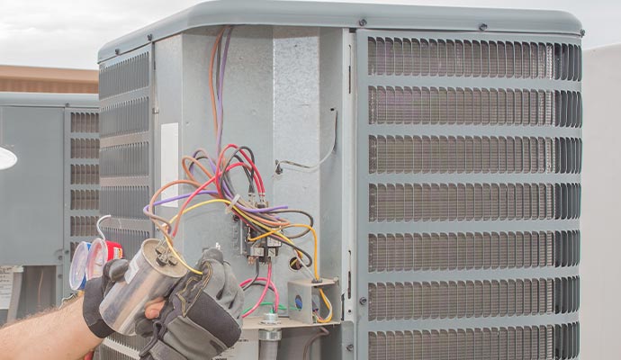 Visible gloves on AC repair technician