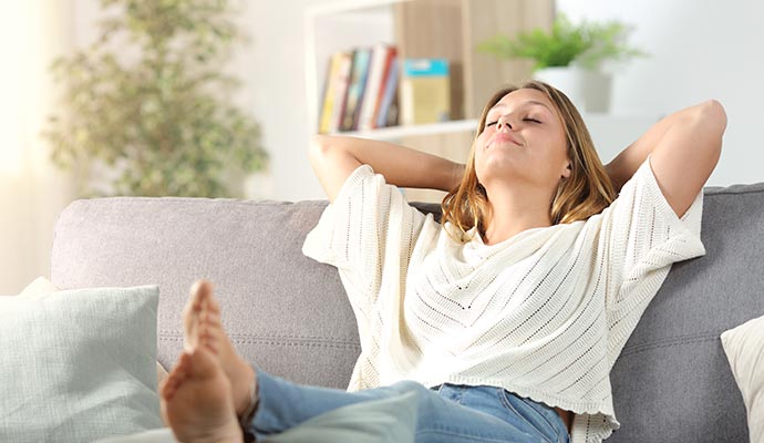 a person enjoying good indoor air quality in living room