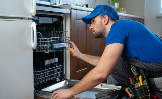 professiona installing dishwasher