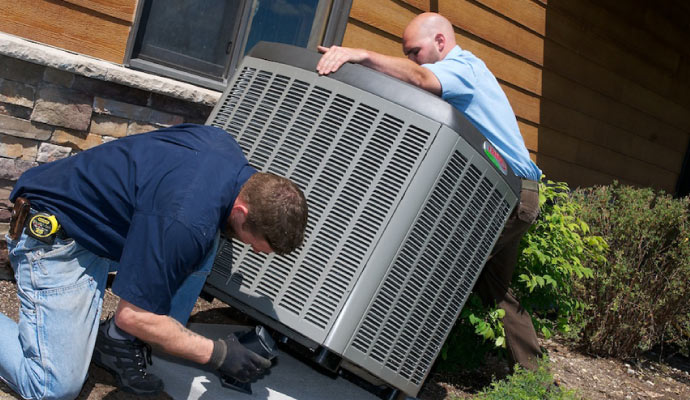 professional workers installing ac